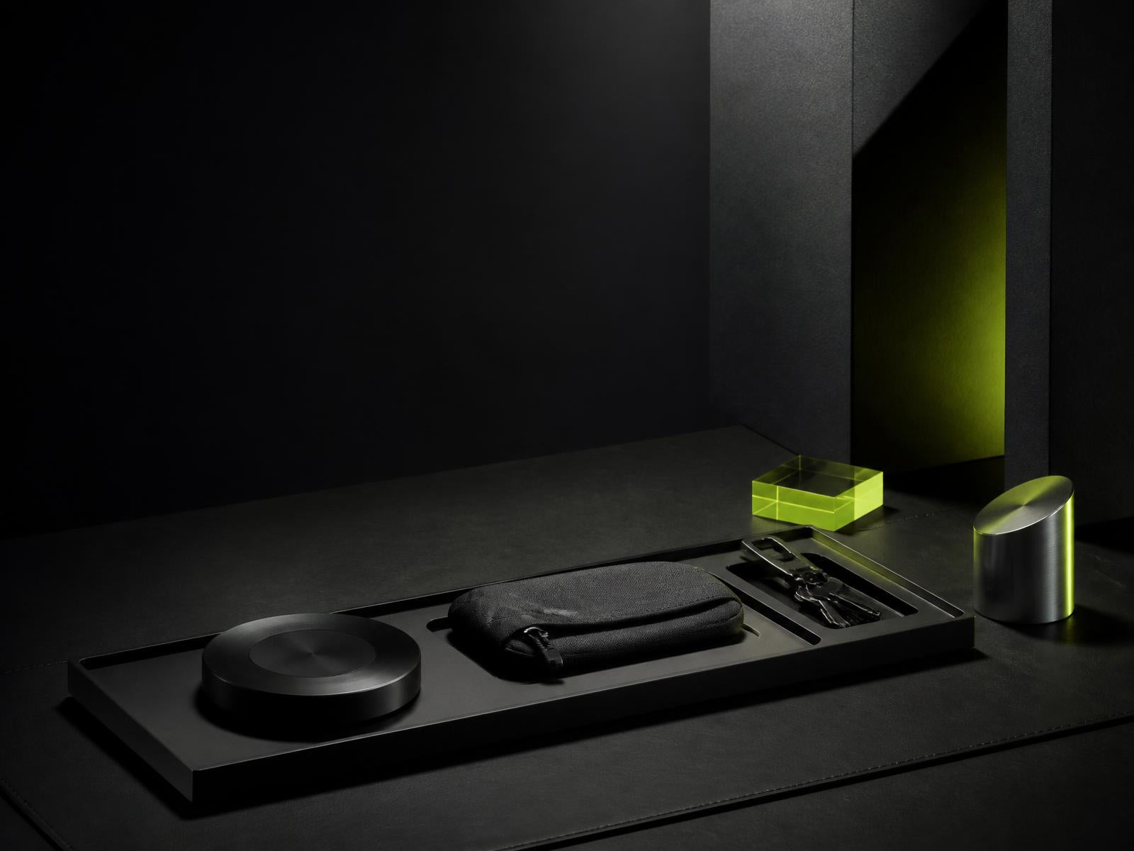moxxi objects arranged in a precise dark studio